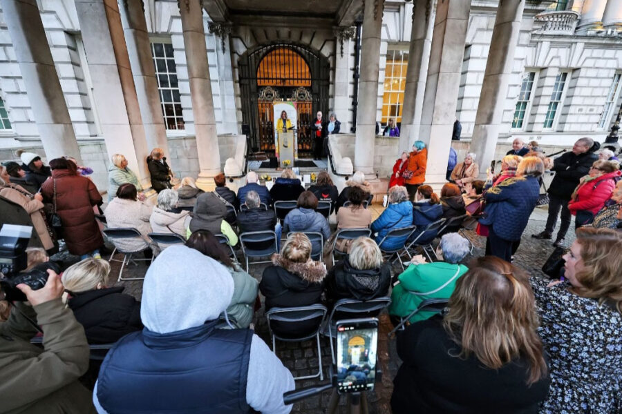 A group of people gathered at a reflection event.